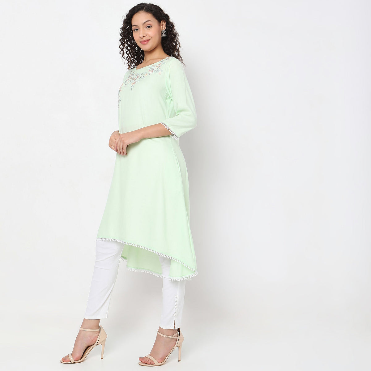 Women Wearing Flare Fit Embroidered Kurta