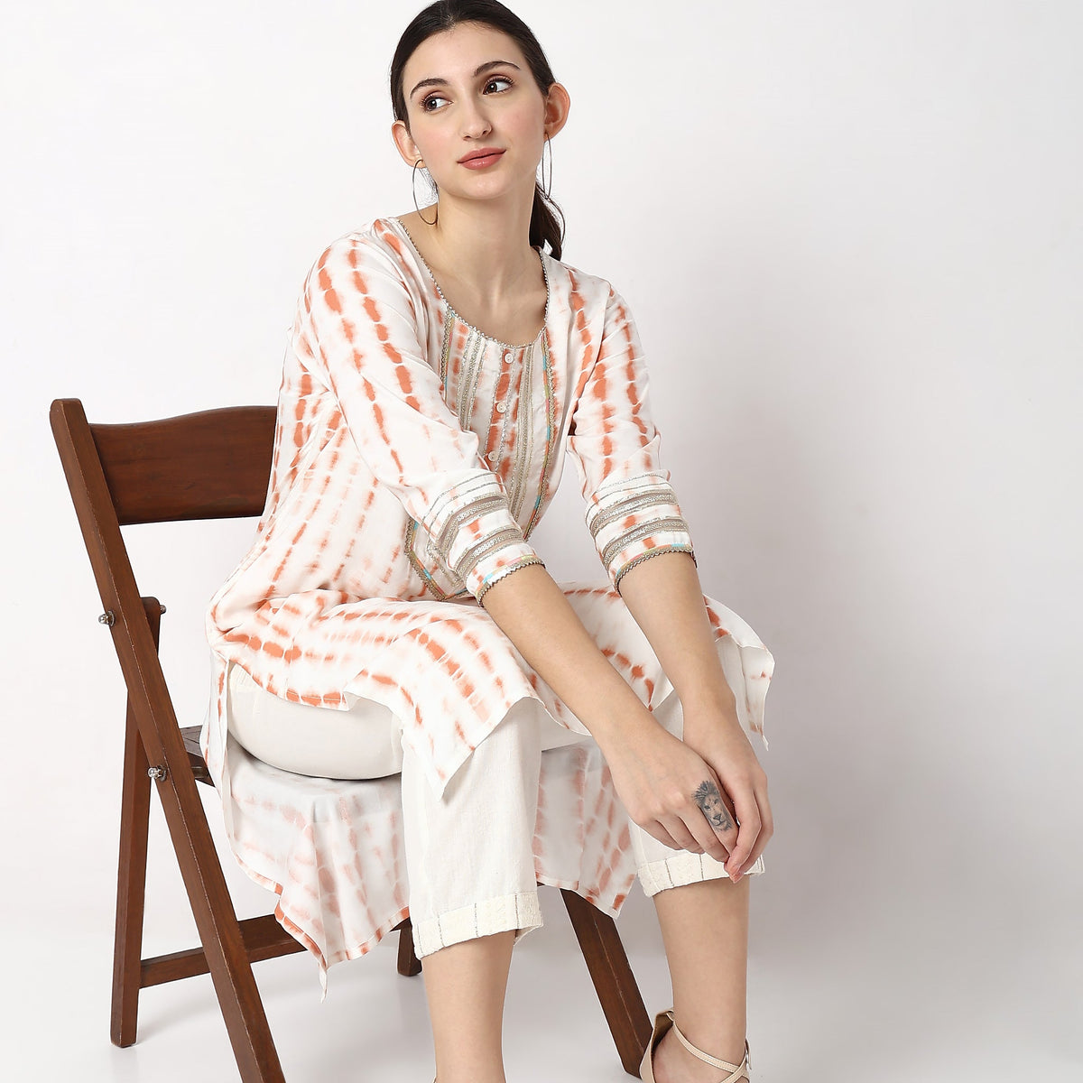 Women Wearing Straight Fit Printed Kurta