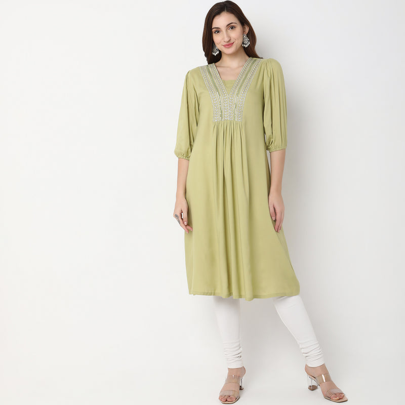 Women Wearing Flare Fit Embroidered Kurta