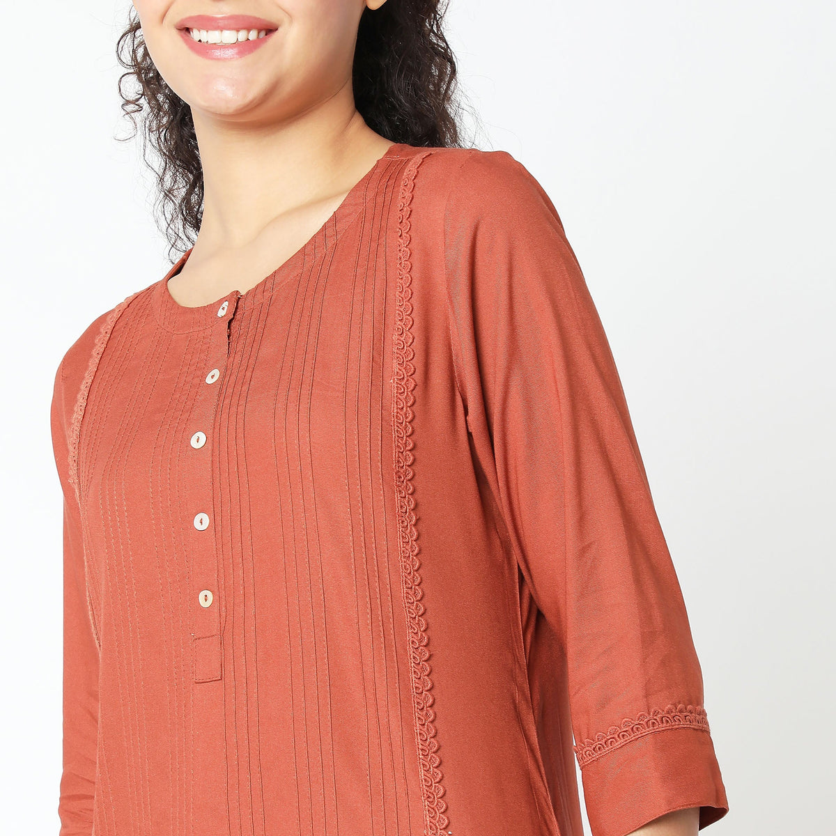 Women Wearing Straight Fit Solid Kurta