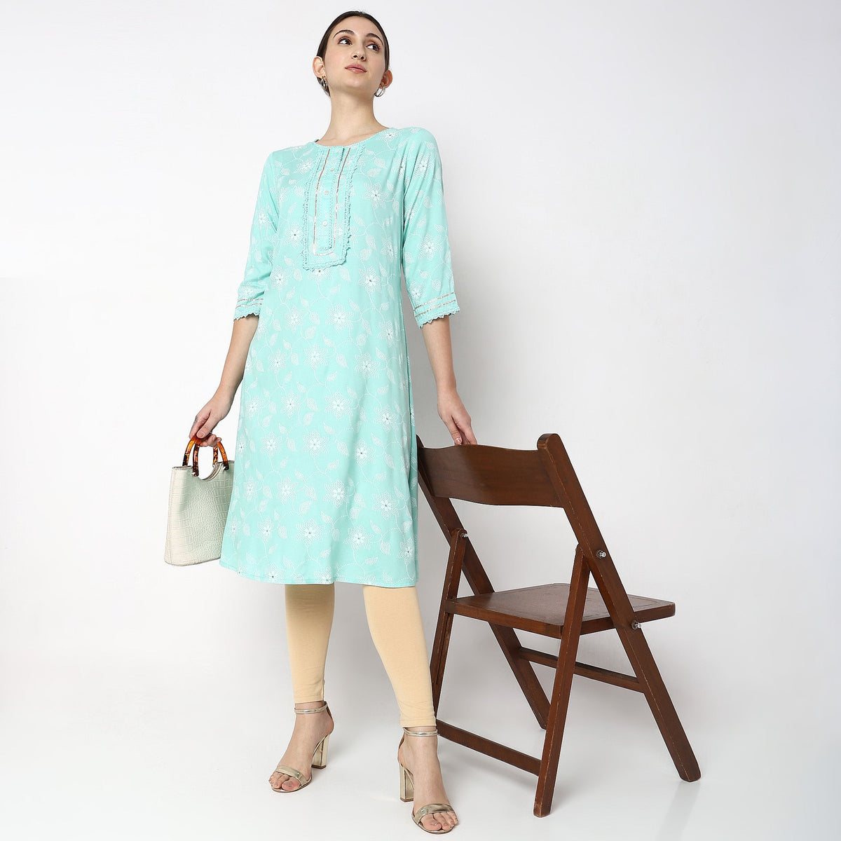 Women Wearing Straight Fit Printed Kurta