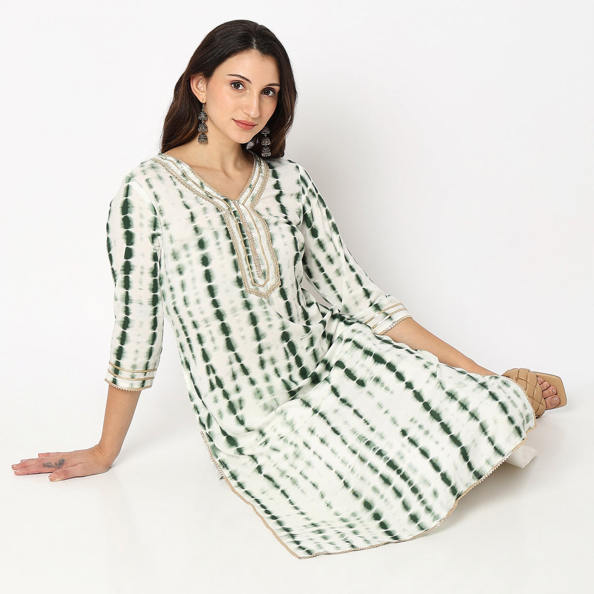 Women Wearing Straight Fit Printed Kurta