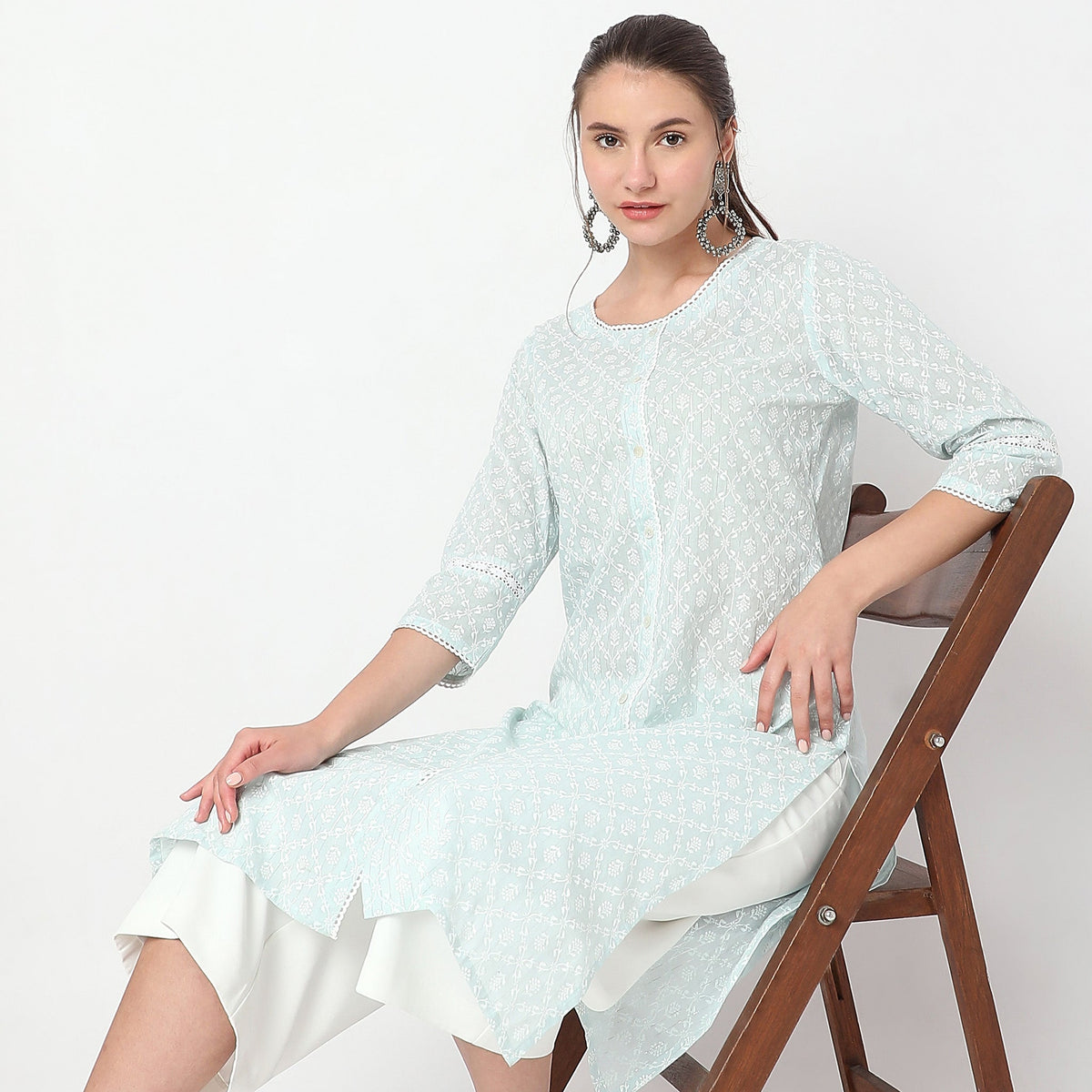 Women Wearing Straight Fit Printed Kurta