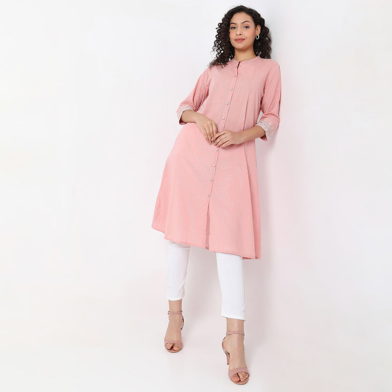 Women Wearing Flare Fit Solid Kurta