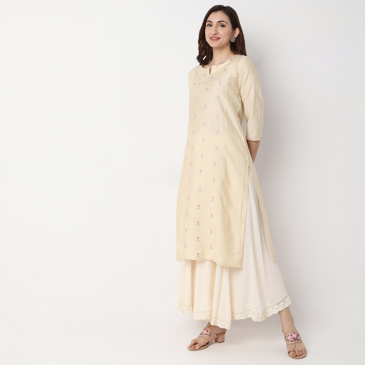 Women Wearing Straight Fit Embroidered Kurta