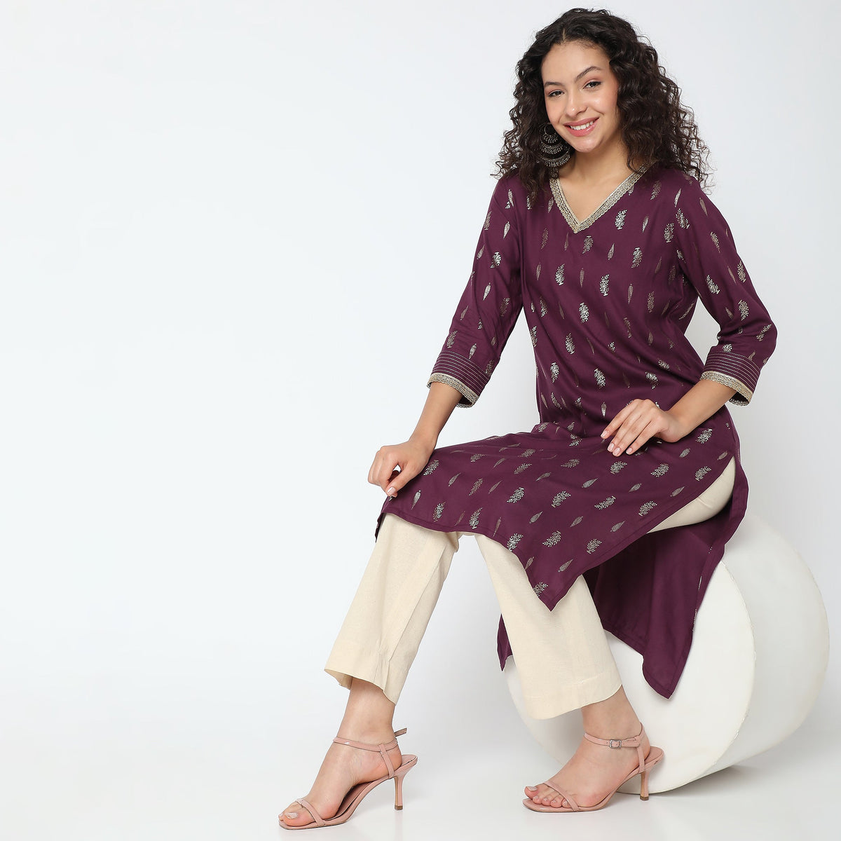 Women Wearing Straight Fit Printed Kurta