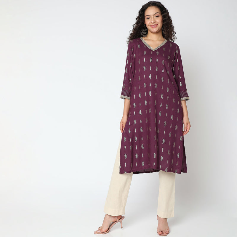 Women Wearing Straight Fit Printed Kurta