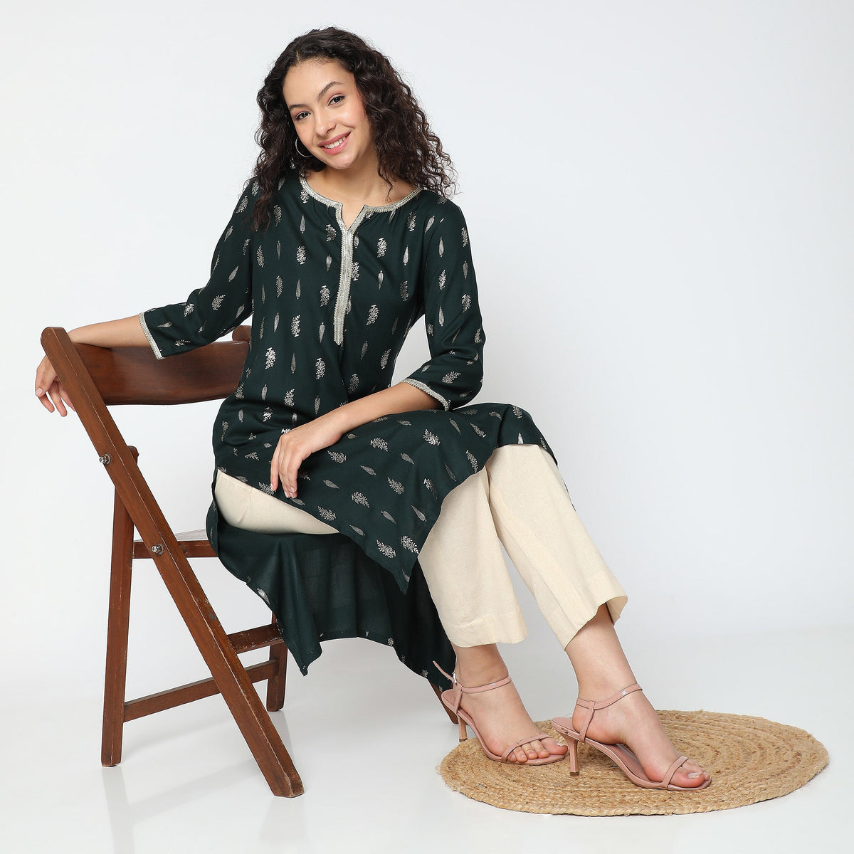 Women Wearing Straight Fit Printed Kurta