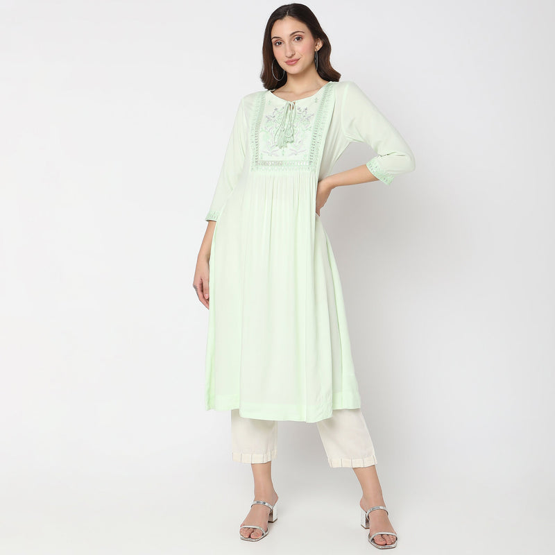 Women Wearing Flare Fit Embroidered Kurta