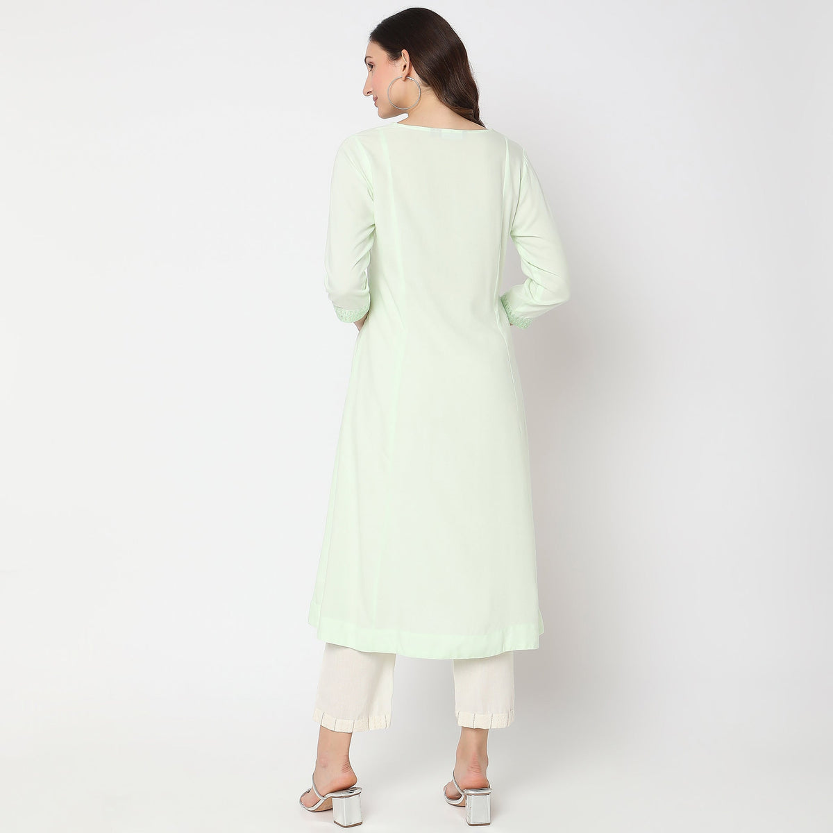 Women Wearing Flare Fit Embroidered Kurta