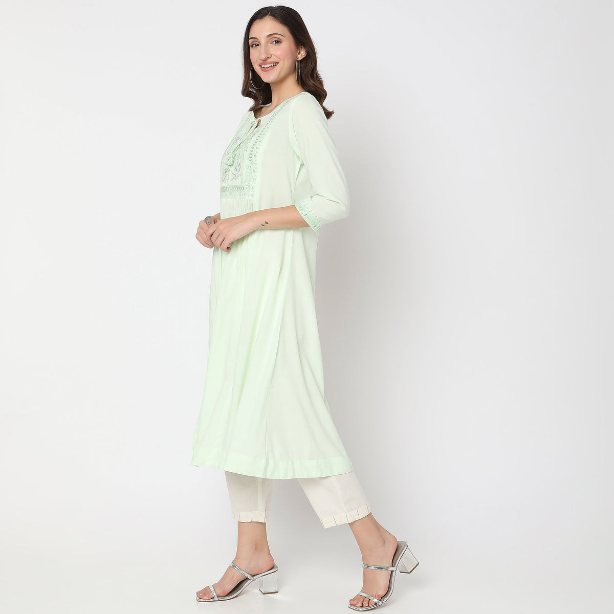 Women Wearing Flare Fit Embroidered Kurta