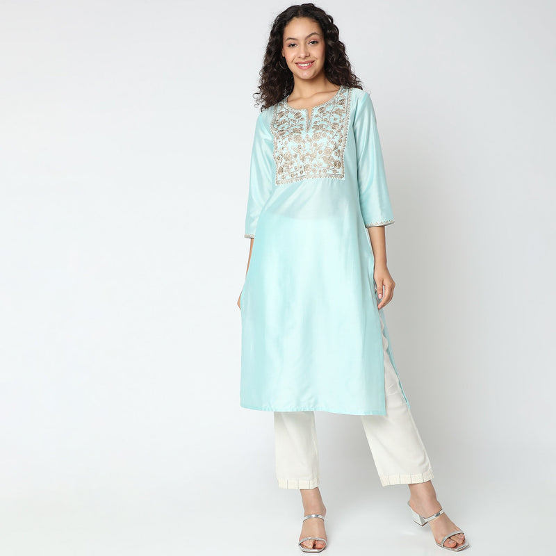 Women Wearing Straight Fit Embroidered Kurta