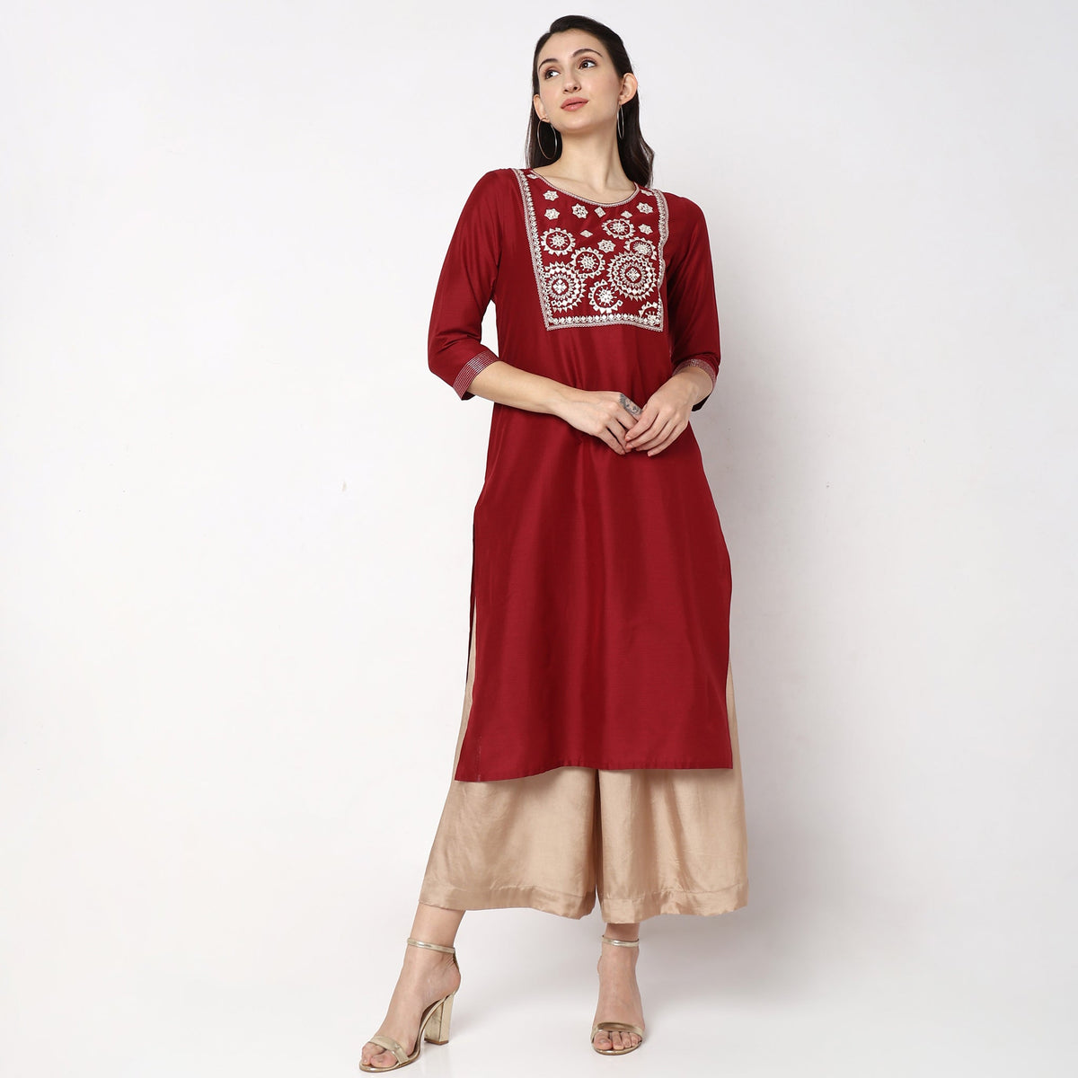 Women Wearing Straight Fit Embroidered Kurta