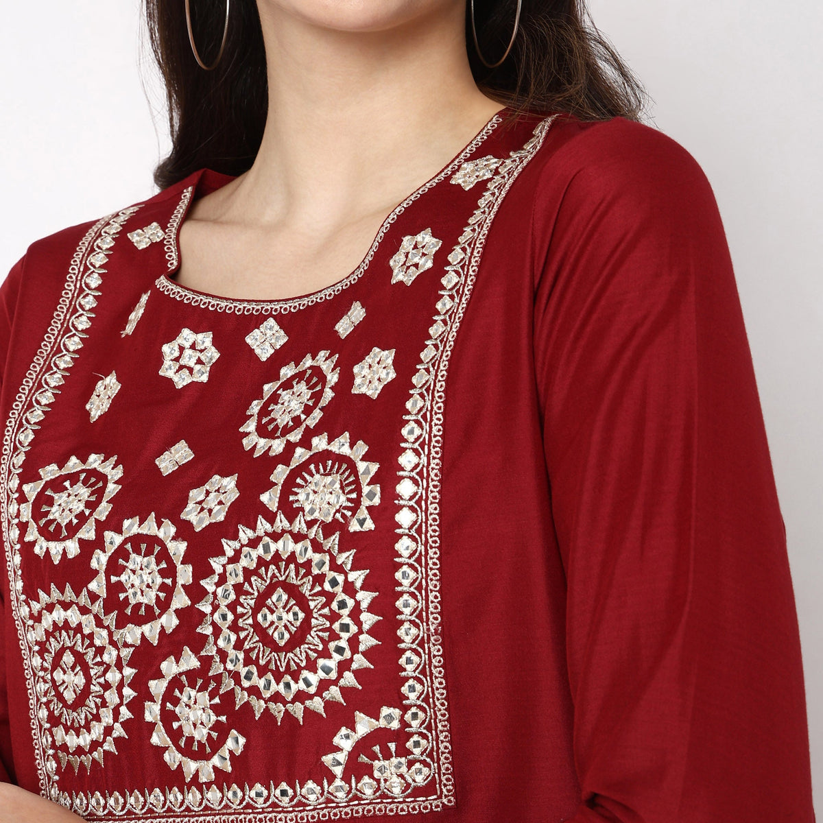 Women Wearing Straight Fit Embroidered Kurta