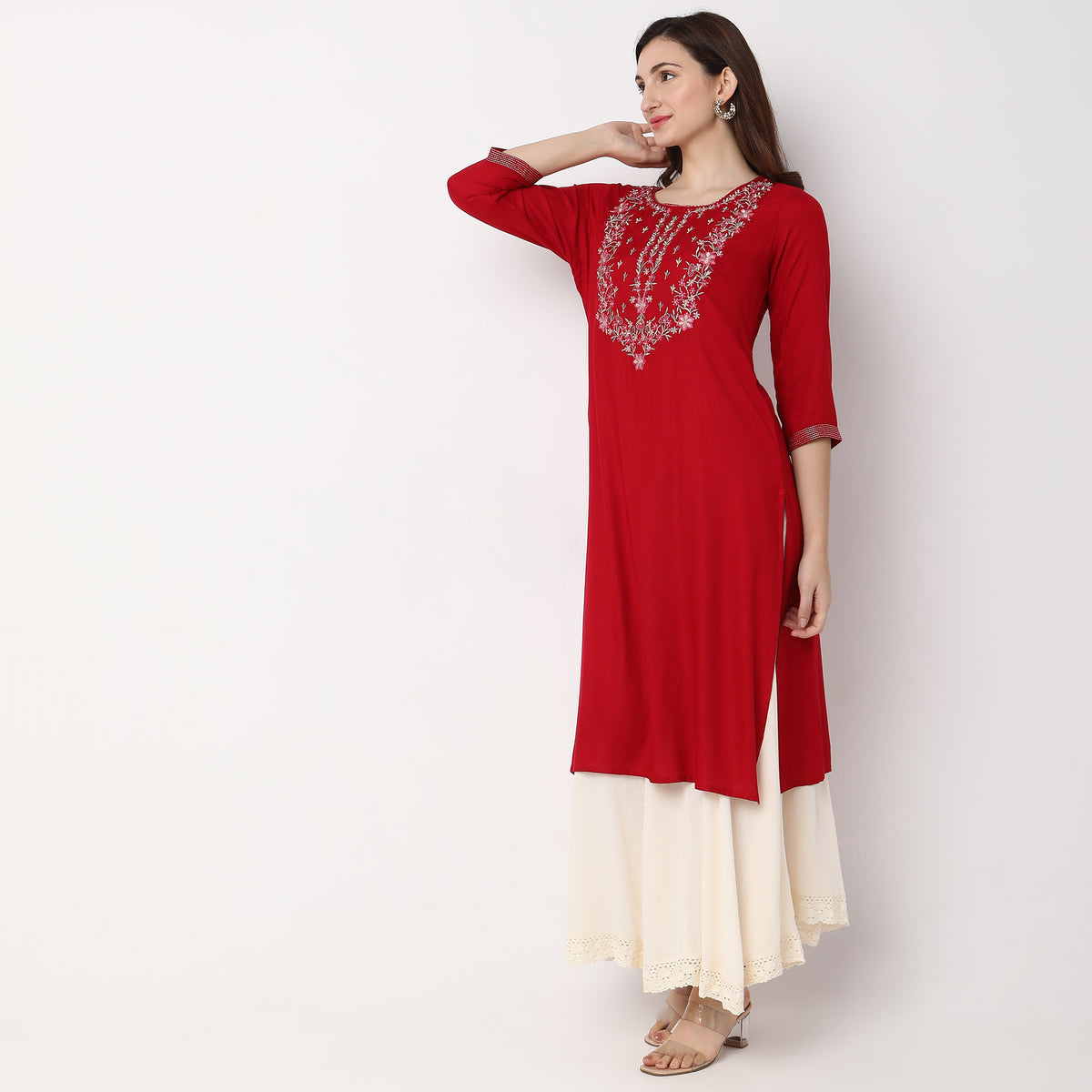 Women Wearing Straight Fit Embroidered Kurta