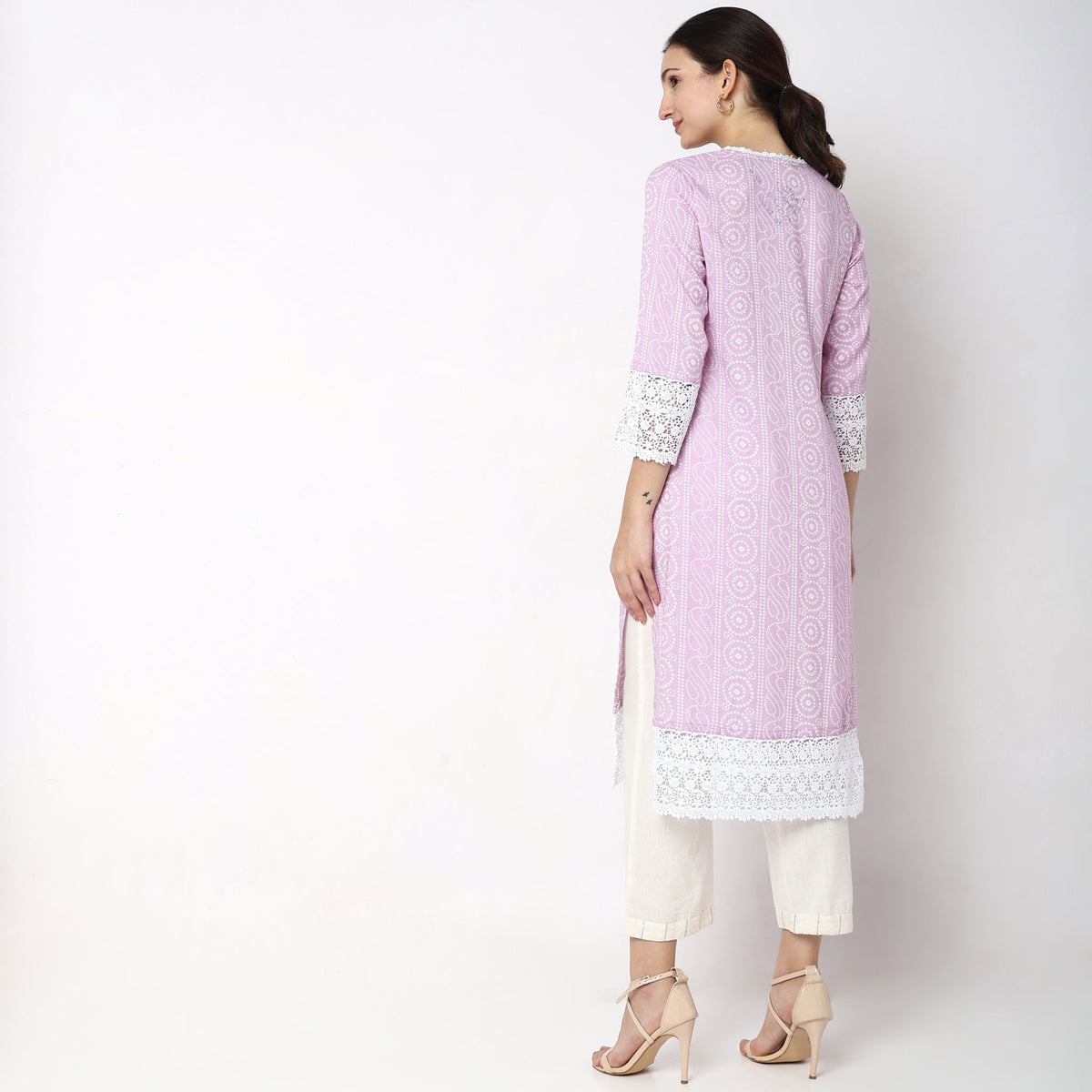 Women Wearing Straight Fit Printed Kurta