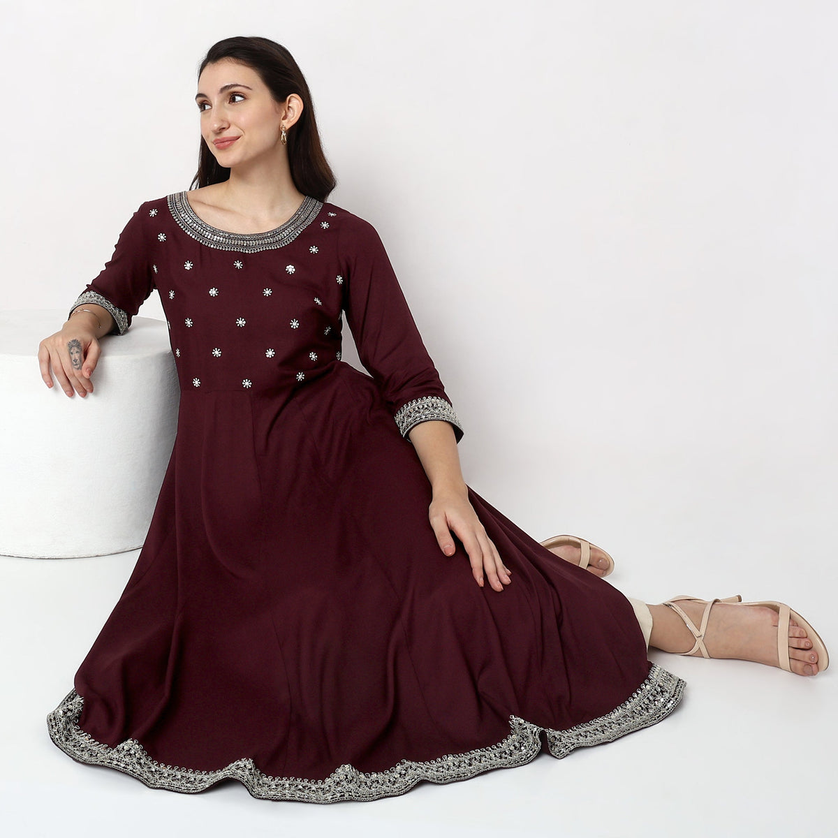 Women Wearing Flare Fit Embroidered Kurta