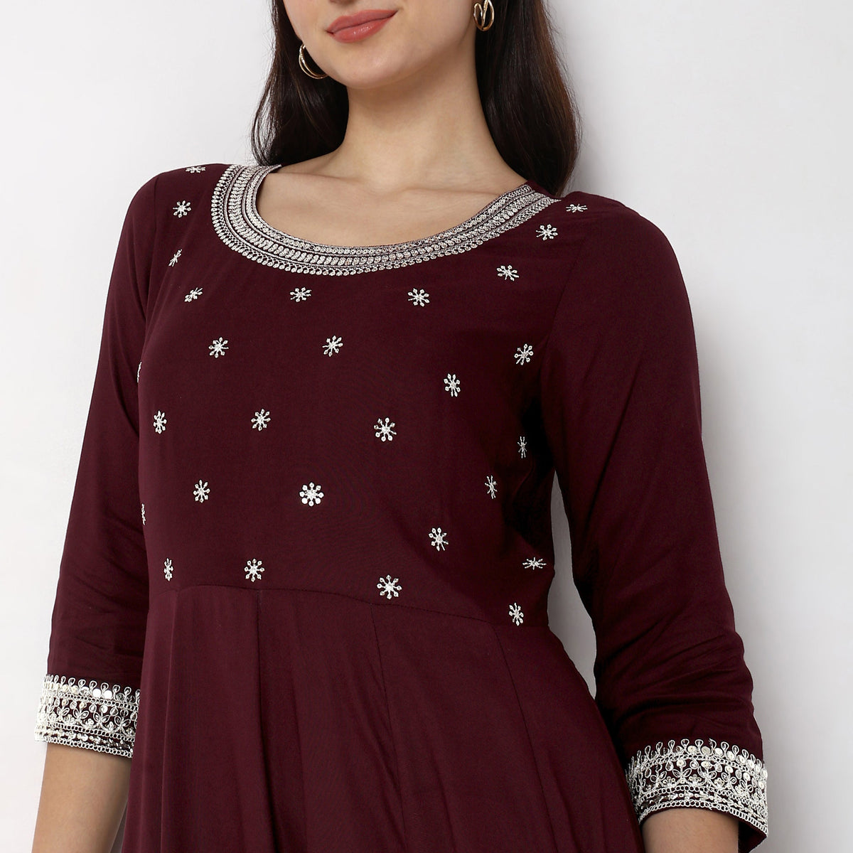 Women Wearing Flare Fit Embroidered Kurta