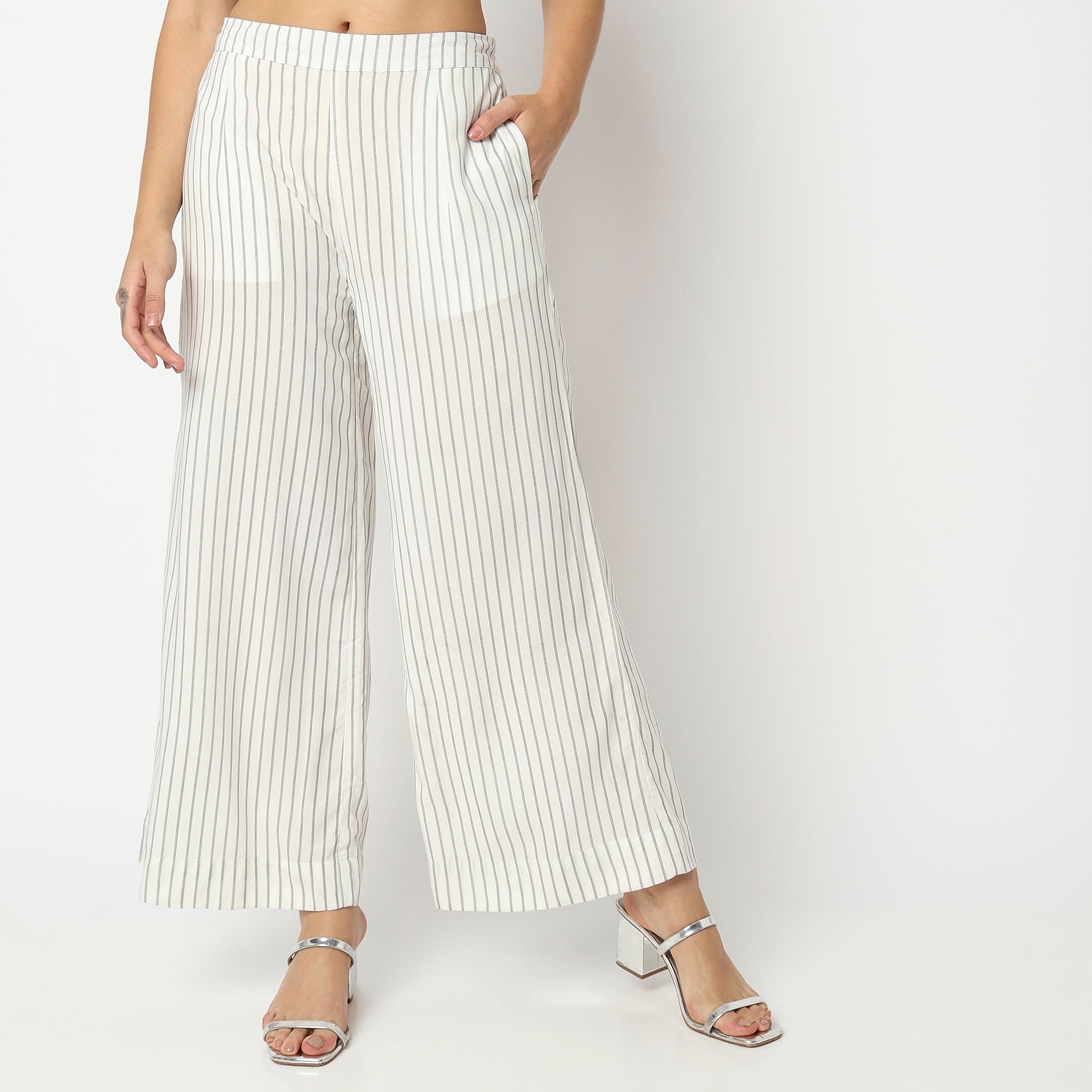 Women Wearing Flare Fit Striped High Rise Palazzo