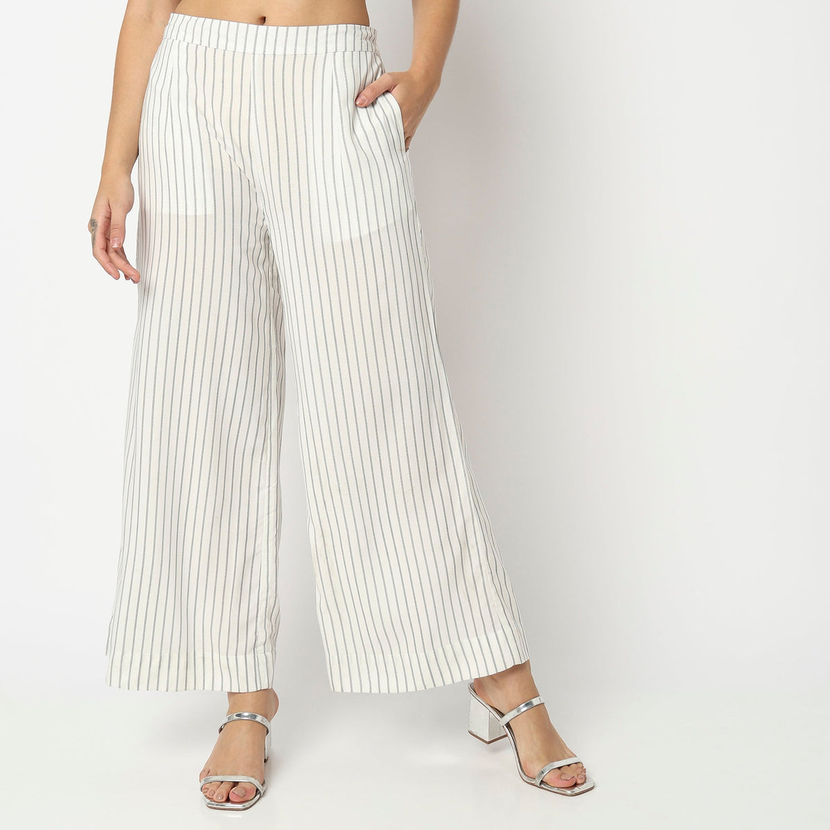 Women Wearing Flare Fit Striped High Rise Palazzo