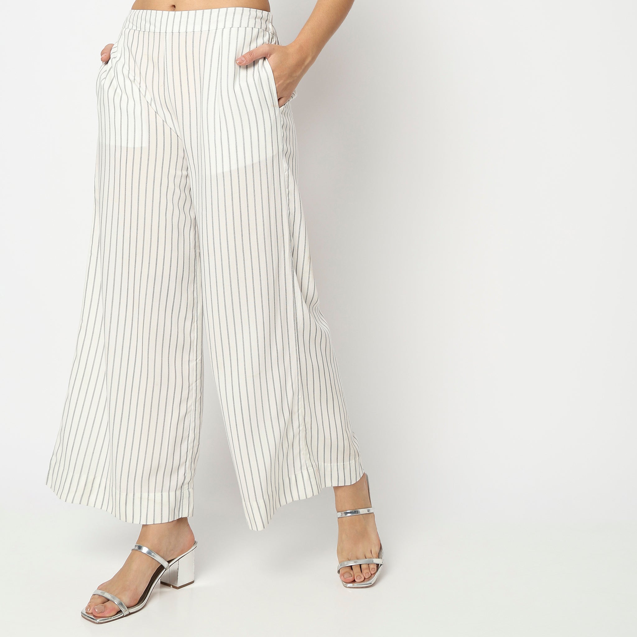 Women Wearing Flare Fit Striped High Rise Palazzo