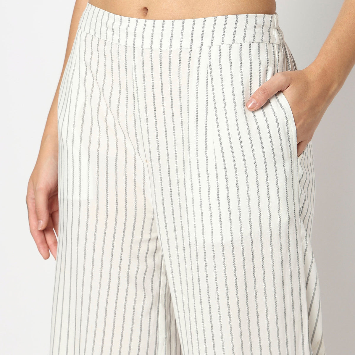 Women Wearing Flare Fit Striped High Rise Palazzo