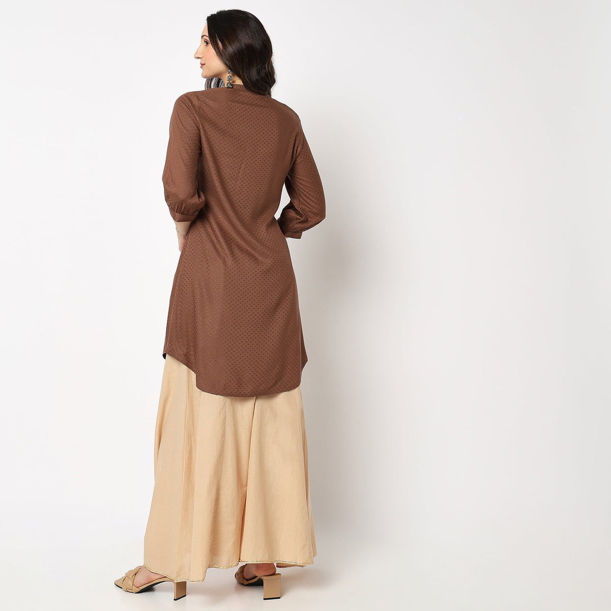 Women Wearing Regular Fit Embroidered Kurta