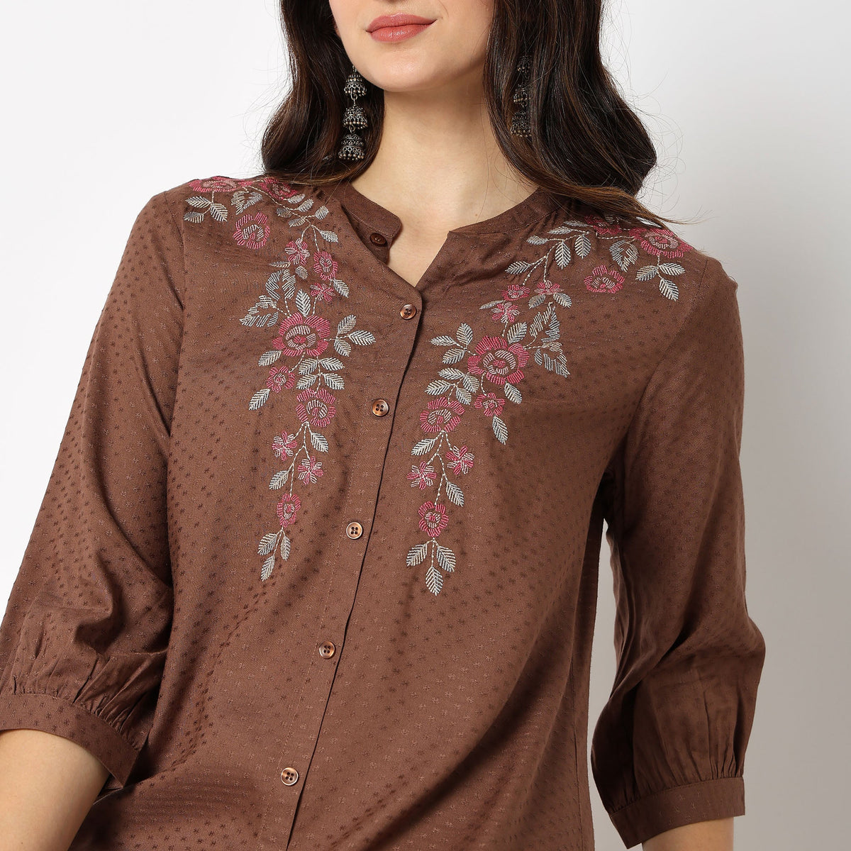 Women Wearing Regular Fit Embroidered Kurta