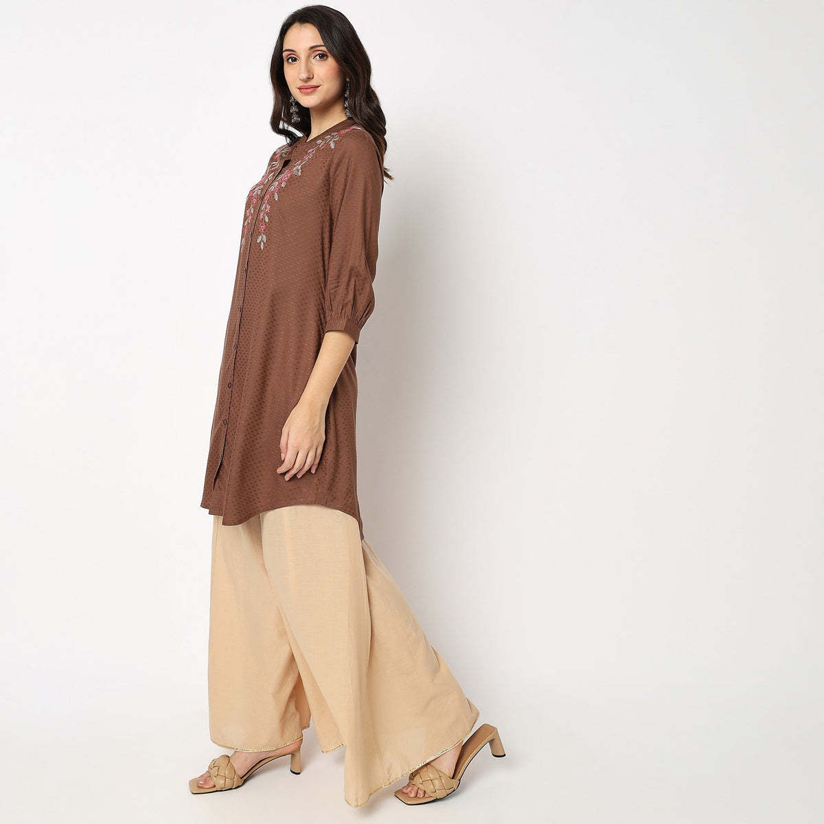 Women Wearing Regular Fit Embroidered Kurta