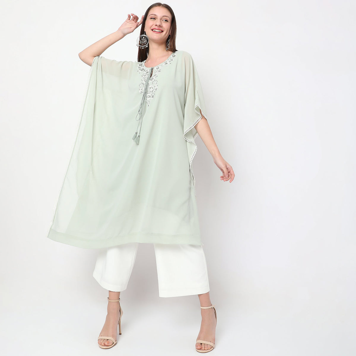 Women Wearing Boxy Fit Embroidered Kurta