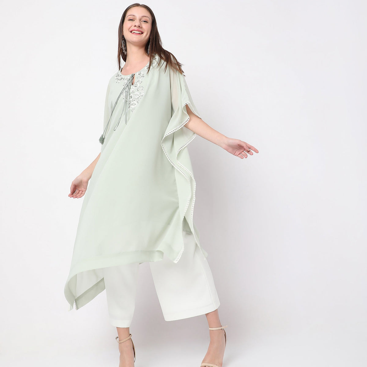 Women Wearing Boxy Fit Embroidered Kurta