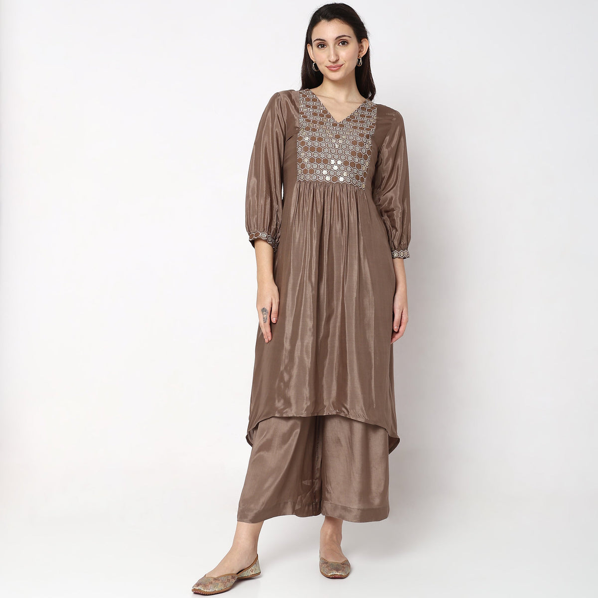 Women Wearing Regular Fit Embellished Kurta