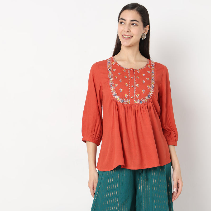 Mid Flare Embroidered Top