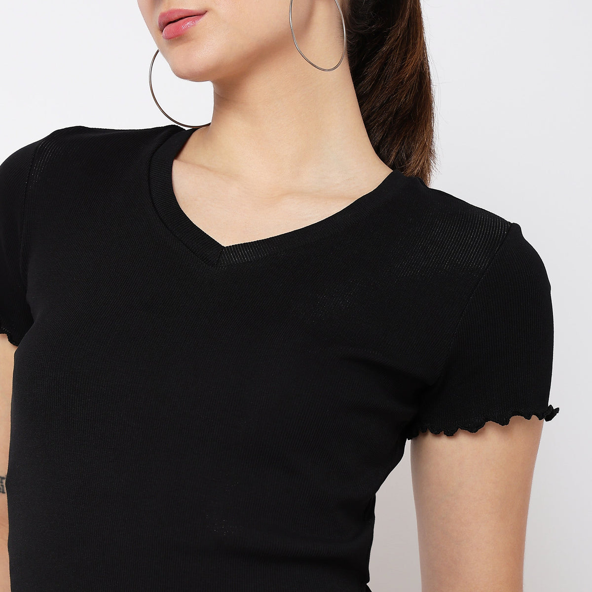 Women Wearing Slim Fit Solid T-Shirt