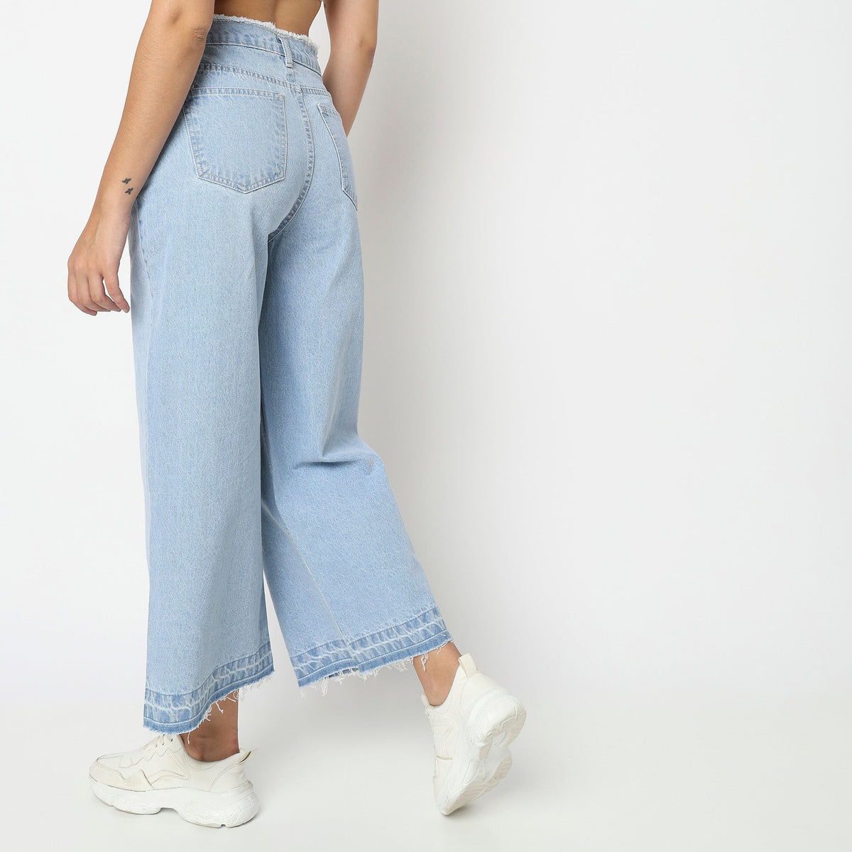 Women Wearing Flare Fit Solid High Rise Jean