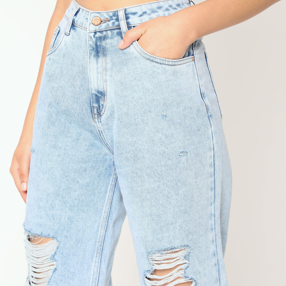 Women Wearing Straight Fit Distressed High Rise Jean