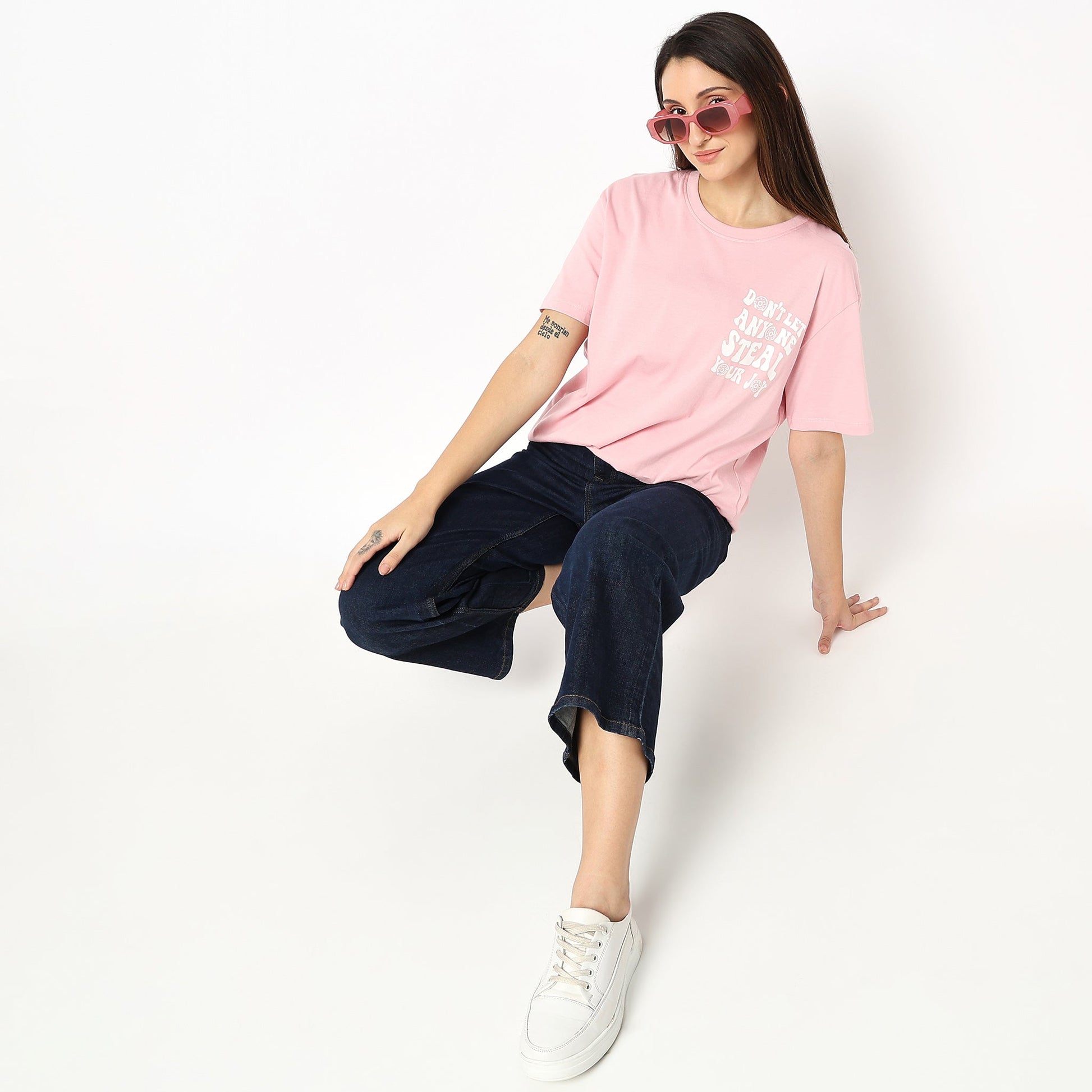 Women Wearing Oversize Graphic T-Shirt