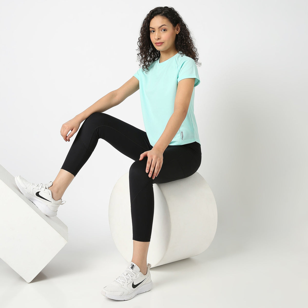 Women Wearing Regular Fit Solid T-Shirt