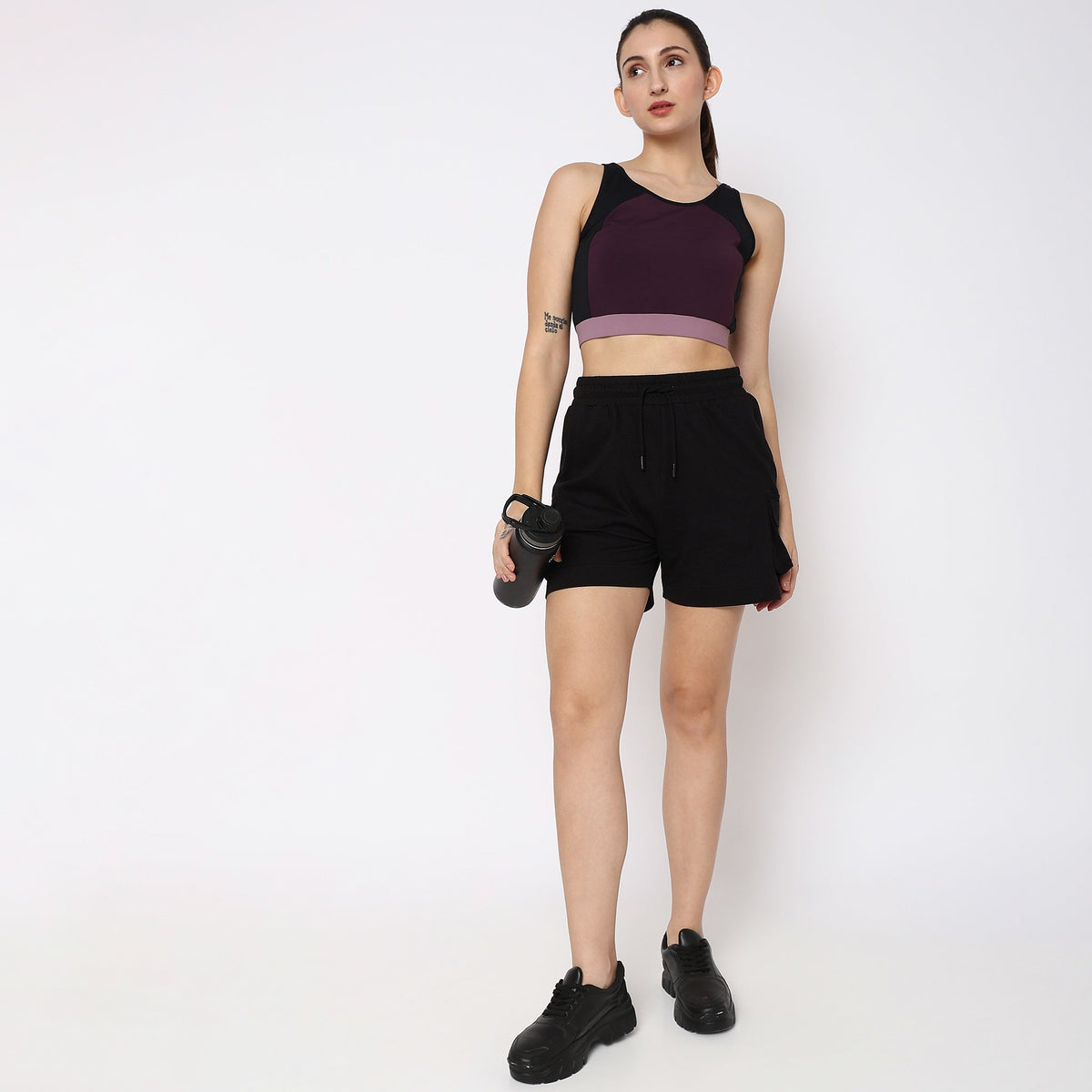 Women Wearing Regular Fit Solid Mid Rise Short