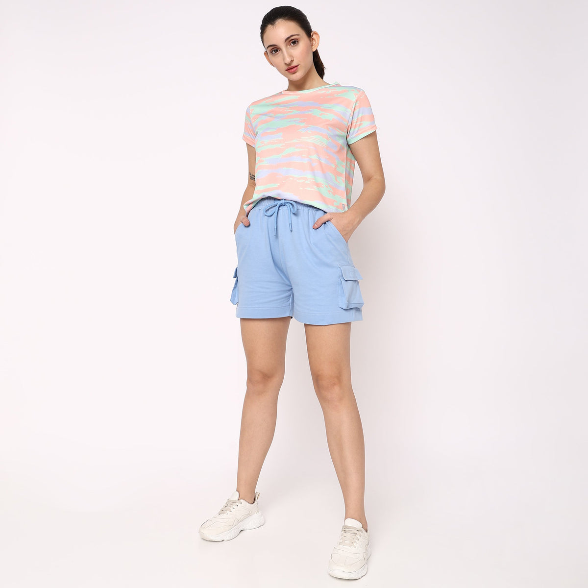 Women Wearing Regular Fit Solid Mid Rise Short