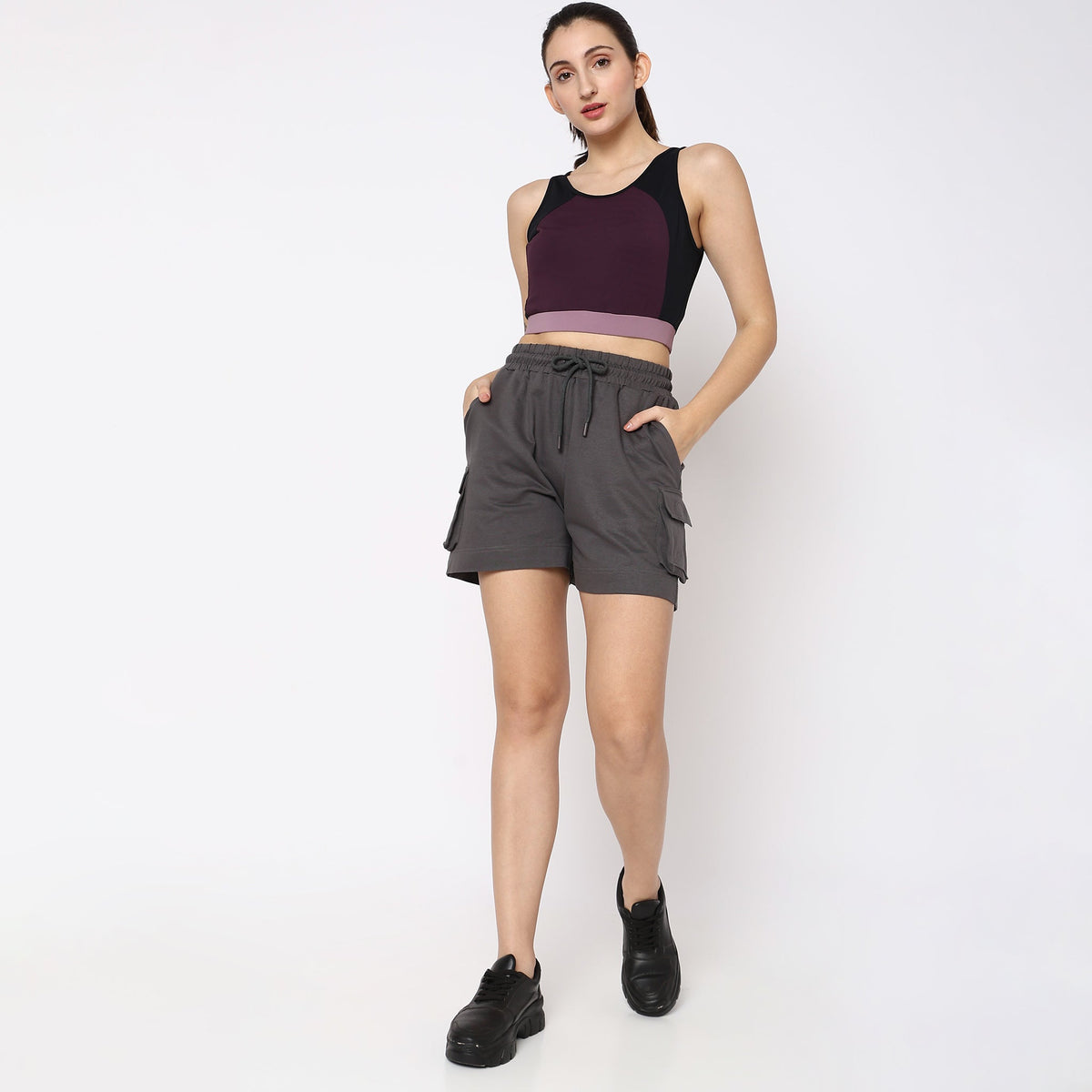 Women Wearing Regular Fit Solid Mid Rise Short