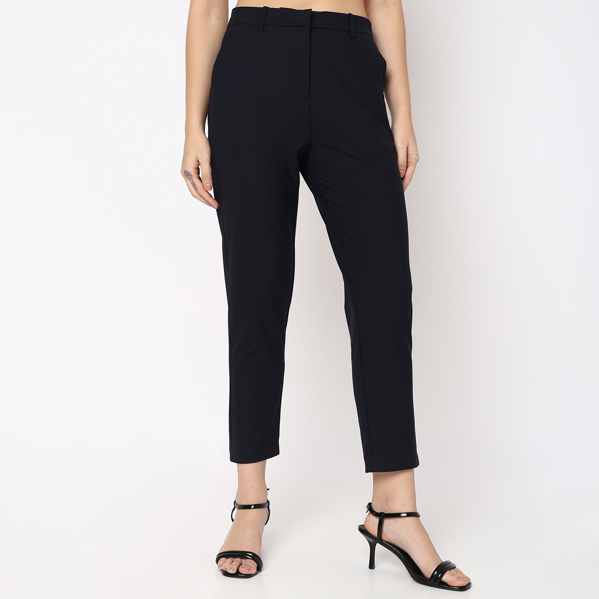 Women Wearing Straight Fit Solid Mid Rise Trouser