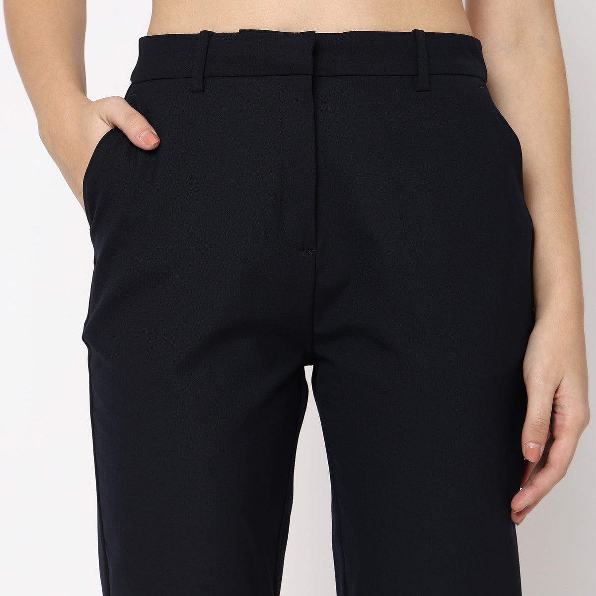 Women Wearing Straight Fit Solid Mid Rise Trouser