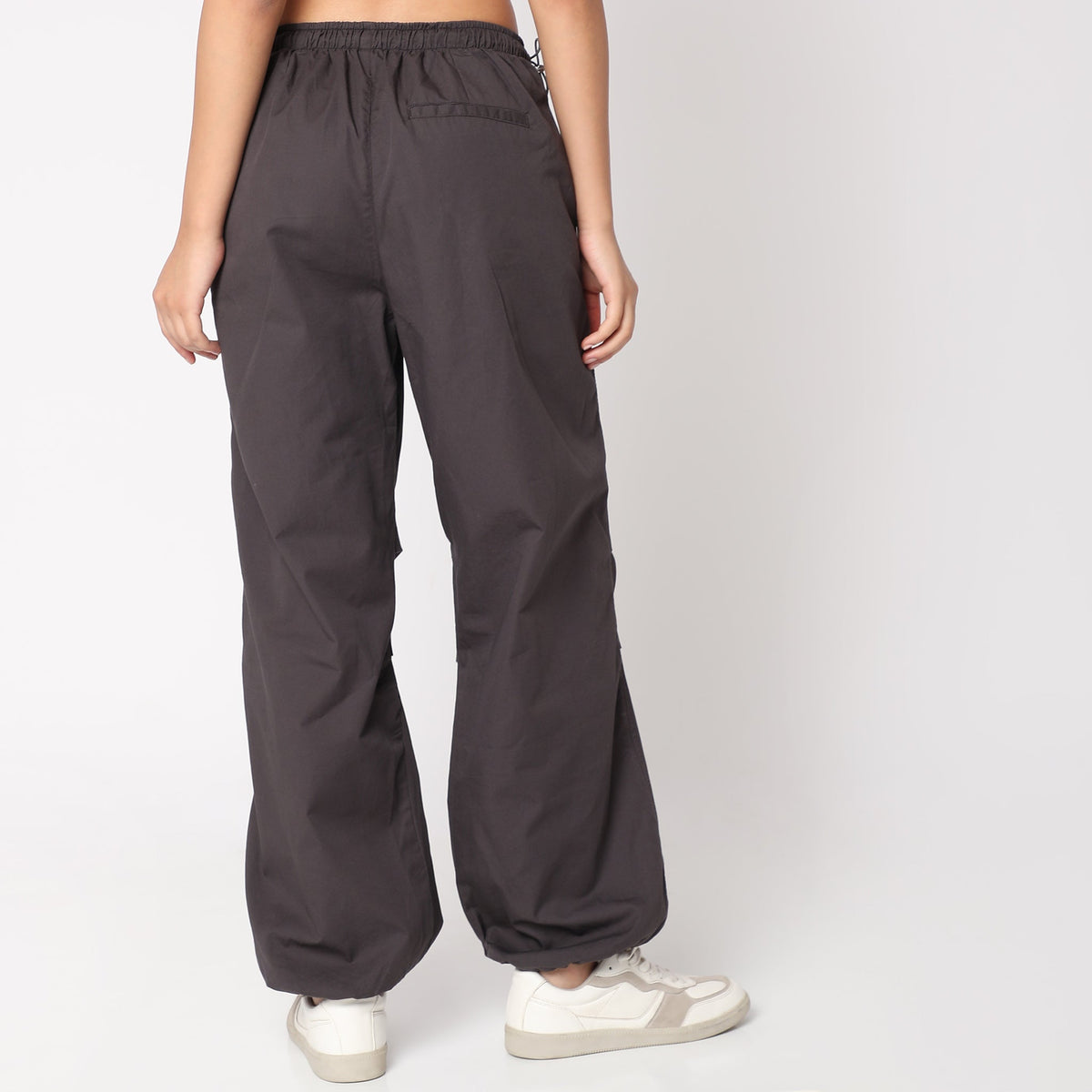 Women Wearing Regular Fit Solid Mid Rise Trouser