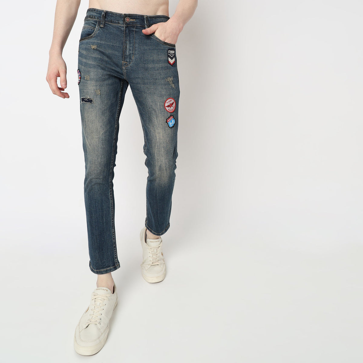 Men Wearing Skinny Fit Distressed Mid Rise Jean