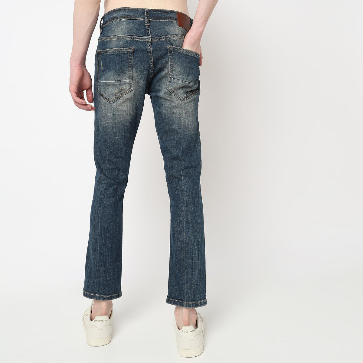 Men Wearing Skinny Fit Distressed Mid Rise Jean