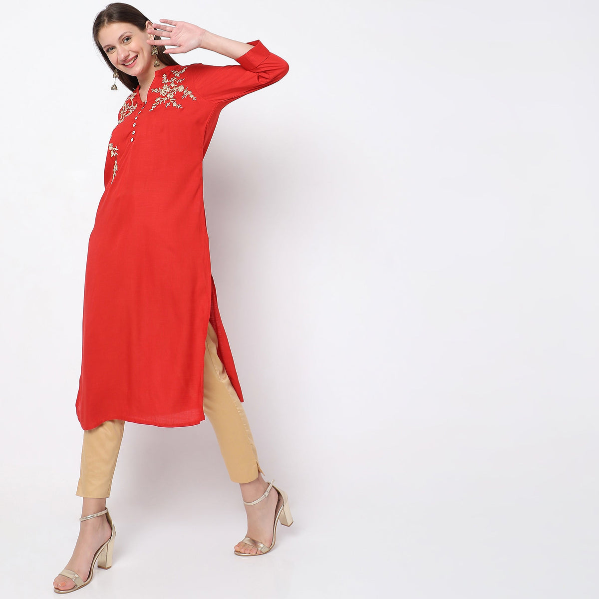 Women Wearing Straight Fit Embroidered Kurta