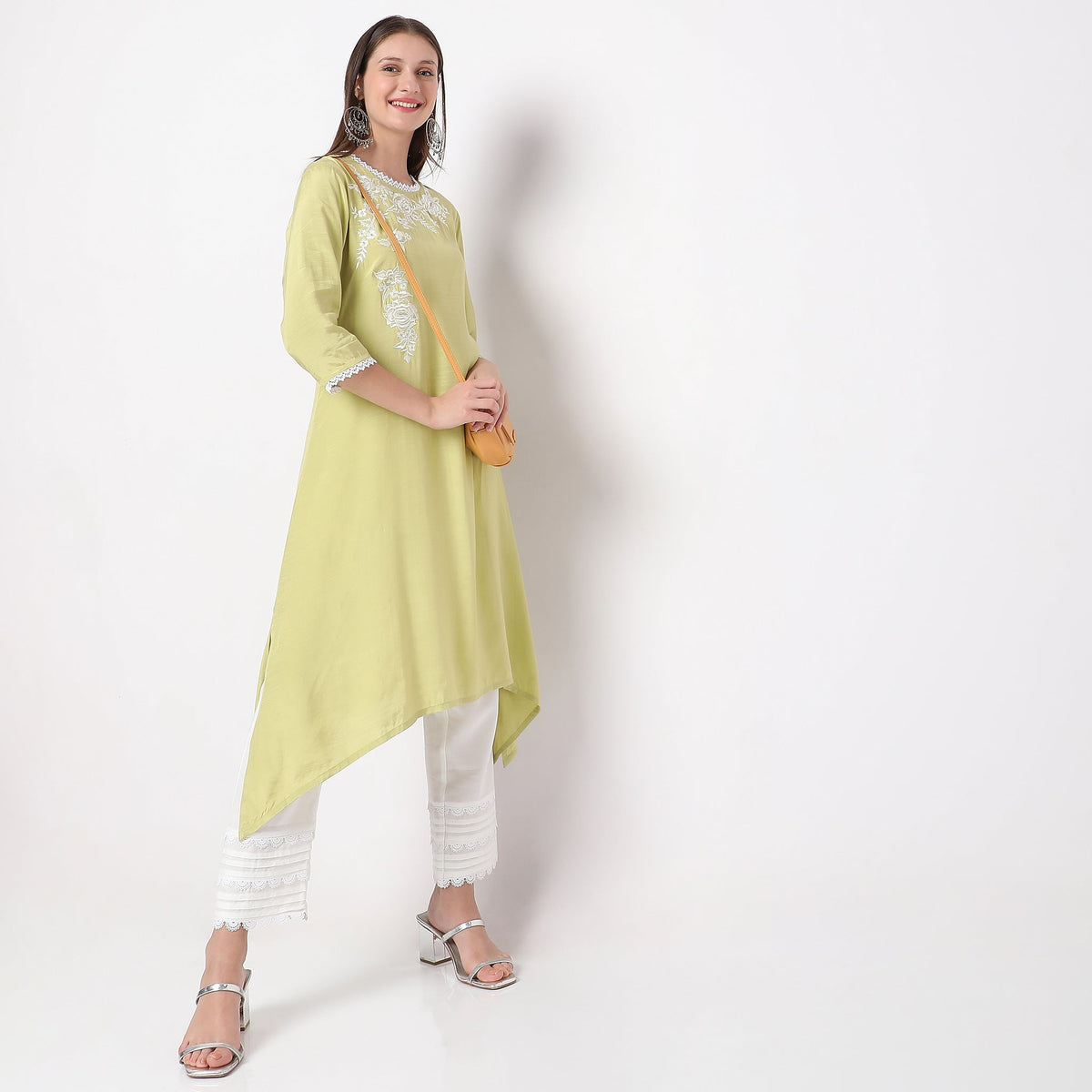 Women Wearing Straight Fit Embroidered Kurta