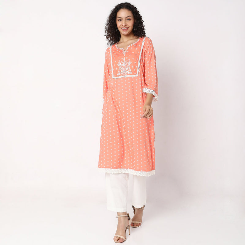 Women Wearing Straight Fit Embroidered Kurta