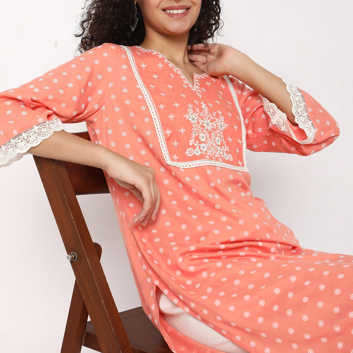 Women Wearing Straight Fit Embroidered Kurta